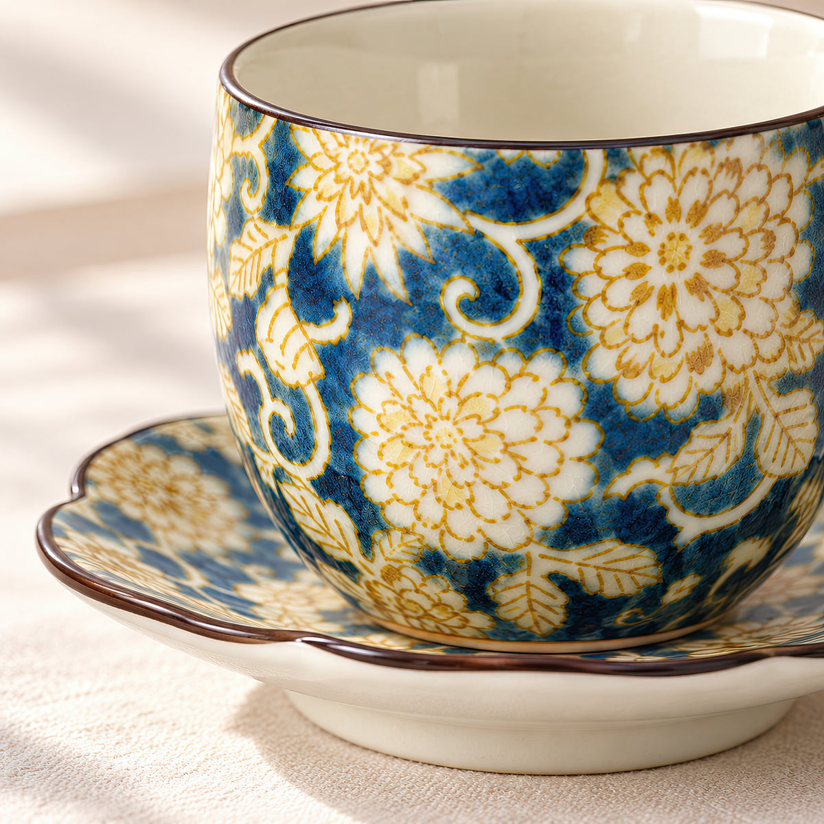 Hana Karakusa Arabesque Japanese Tea Cup & Stand — Blue — floral tea cup and matching stand close-up