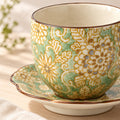 Hana Karakusa Arabesque Japanese Tea Cup & Stand — Green — floral tea cup and matching stand close-up