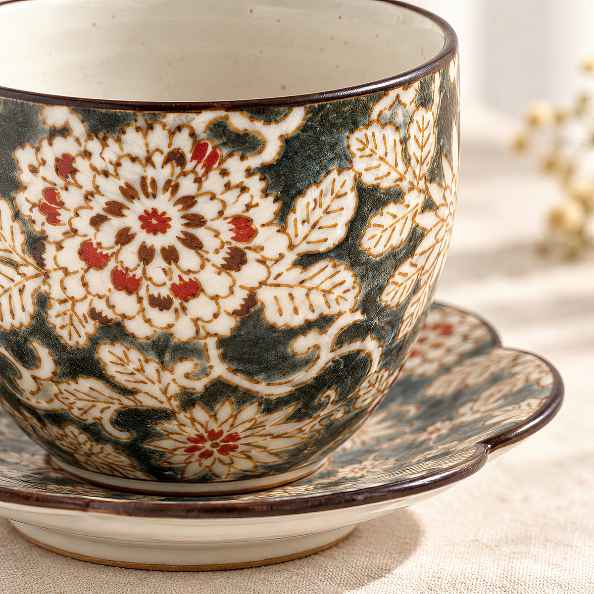 Hana Karakusa Japanese Tea Cup & Stand — Black — floral ceramic product close-up
