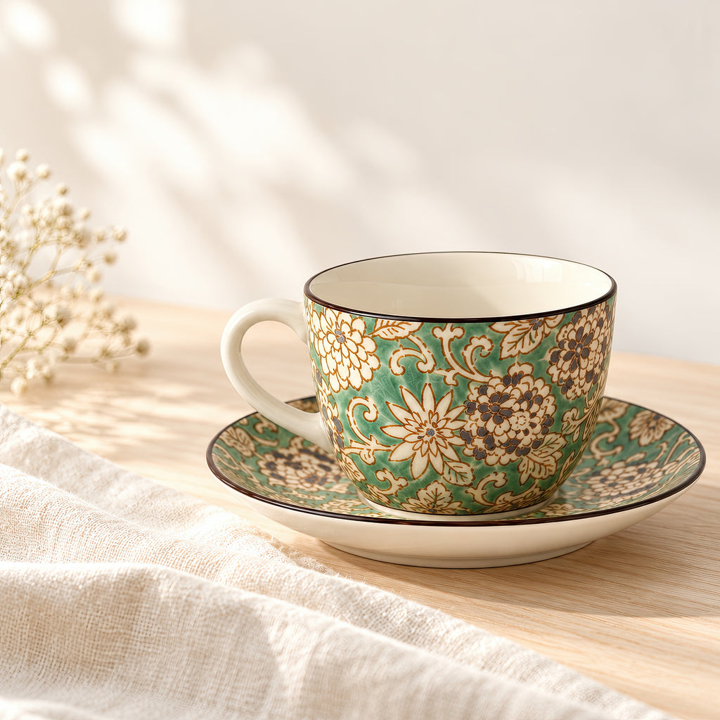 Hana Karakusa Tea Cup & Saucer A Green ceramic cup and saucer