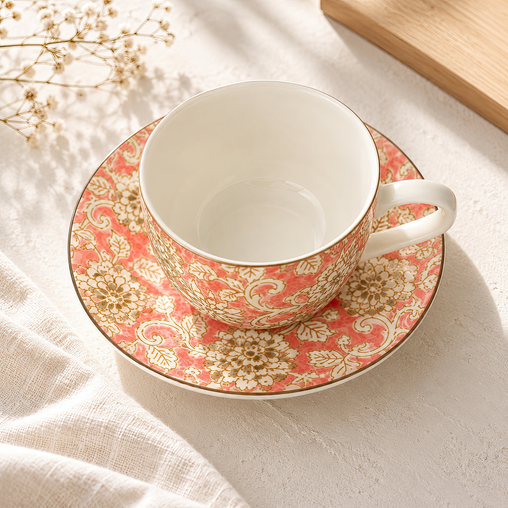 Hana Karakusa Tea Cup & Saucer A Pink ceramic cup and saucer