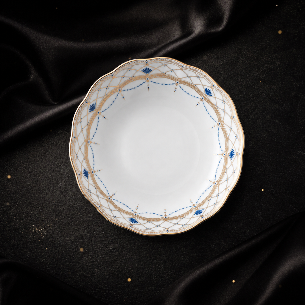 Angled top view of the Valesse Azure 14.9 cm fruit bowl, showing its scalloped outline and decorated inner rim.