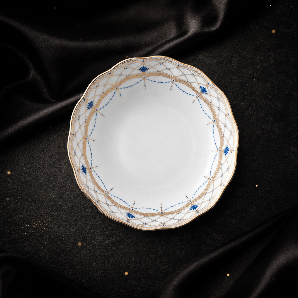 Angled top view of the Valesse Azure 14.9 cm fruit bowl, showing its scalloped outline and decorated inner rim.