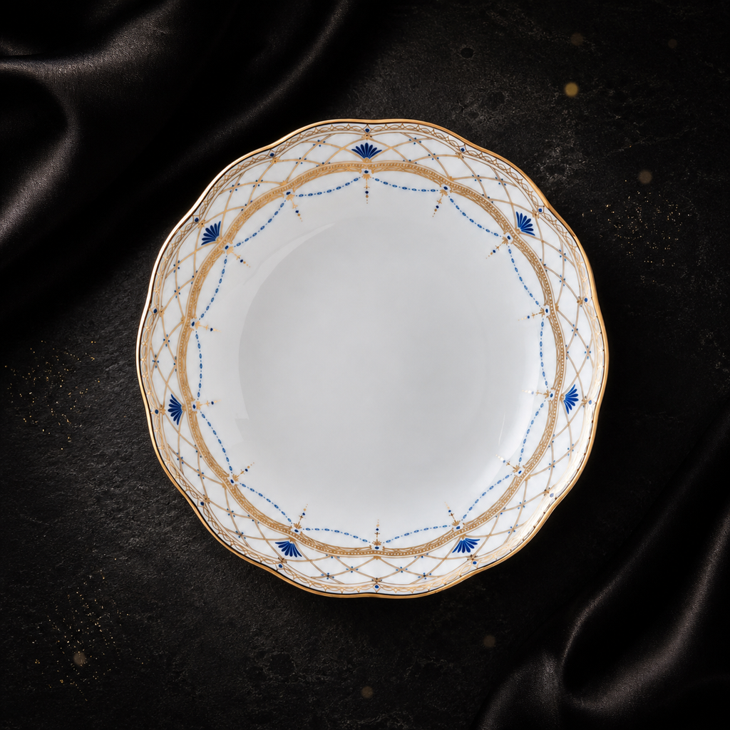 Top view of the Valesse Azure 14.9 cm fruit bowl in white bone china with a scalloped blue-and-gold decorative rim.