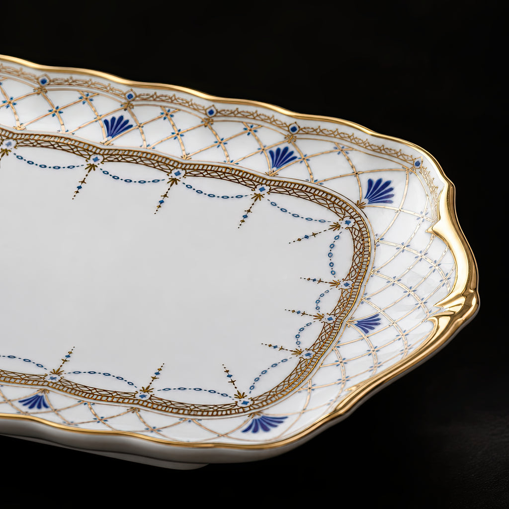 Close-up of the Valesse Azure small tray showing blue fan motifs, gold latticework and the shaped decorative edge.