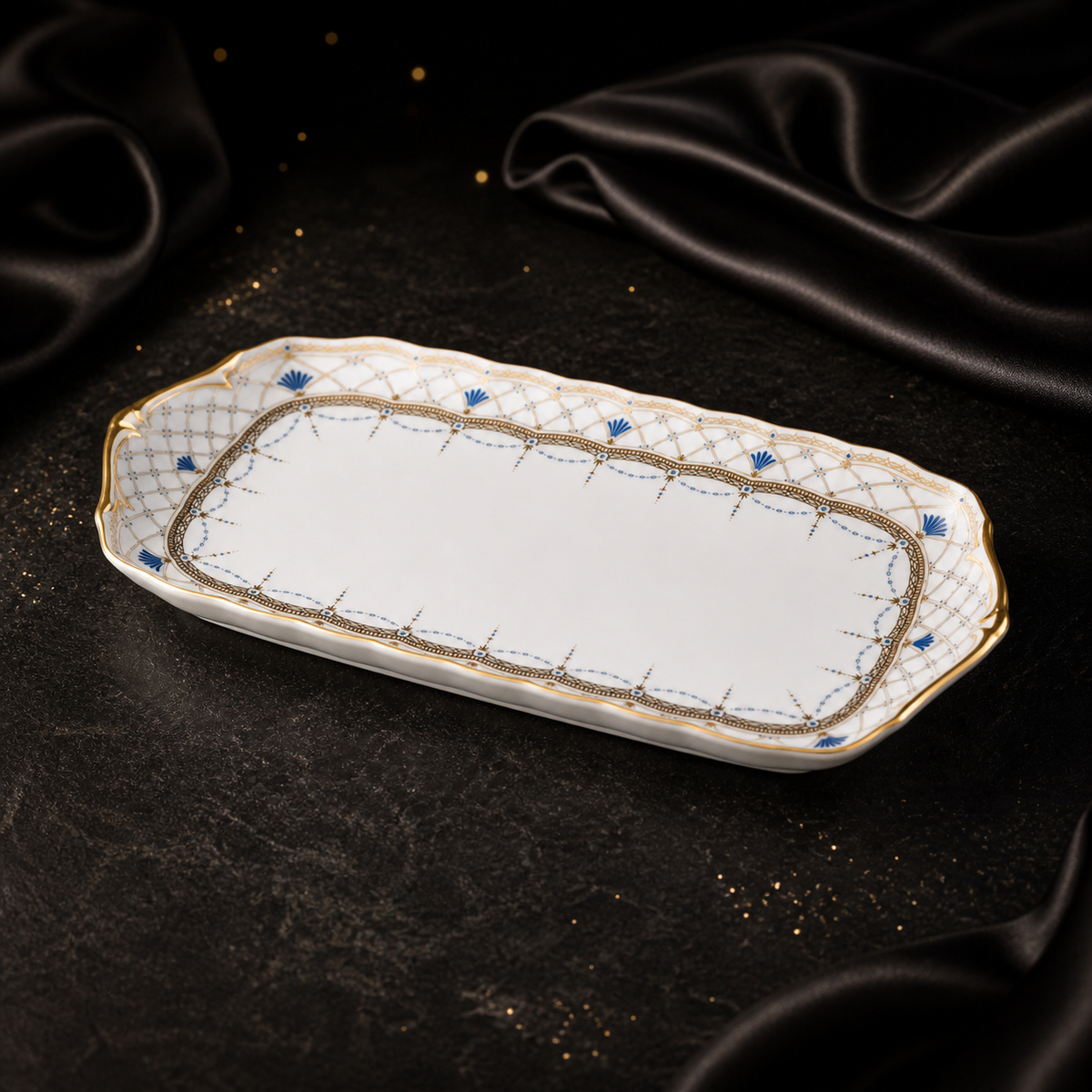 Three-quarter view of the empty Valesse Azure 23 cm small tray on dark stone with black satin styling.